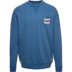 Bluza Tommy Jeans Light Washed DM0DM06602. Niebieskie bluzy męskie Tommy Jeans, s, bez wzorów, z jeansu, bez kołnierzyka, bez rękawów, bez kaptura. W wyprzedaży za 199,00 zł.