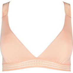 Top w kolorze brzoskwiniowym. Pomarańczowe topy damskie Skiny Women & Men, bez wzorów, bez kołnierzyka. W wyprzedaży za 42,95 zł.