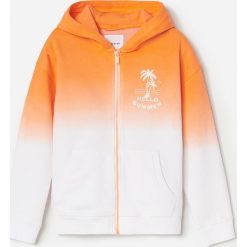 Bluza dresowa z kapturem - Pomarańczowy. Pomarańczowe bluzy męskie Reserved, bez wzorów, z dresówki, z kapturem, bez rękawów, z kapturem. W wyprzedaży za 39,99 zł.