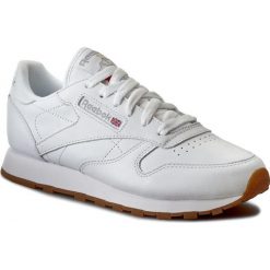 Buty Reebok - Cl Lthr 49803 White/Gum. Białe buty sportowe damskie Reebok, na co dzień, bez wzorów, ze skóry, bez obcasa, na płaskiej podeszwie, bez zapięcia. W wyprzedaży za 219,00 zł.