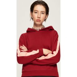 Bluza z kapturem - Bordowy. Czerwone bluzy z kapturem damskie Sinsay, l. Za 49,99 zł.