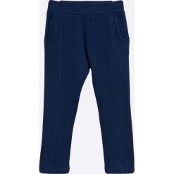 Blukids - Spodnie dziecięce 98-128 cm. Niebieskie rurki dziewczęce Blukids, bez wzorów, z elastanu, sportowe. W wyprzedaży za 29,90 zł.
