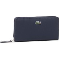 Duży Portfel Damski LACOSTE - L Zip Wallet NF2900PO Eclipse 141. Niebieskie portfele damskie Lacoste, bez wzorów, ze skóry ekologicznej. W wyprzedaży za 319,00 zł.