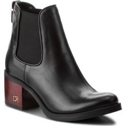 Botki CARINII - B4667/C E50-000-POL-861. Czarne buty zimowe damskie marki Carinii, ze skóry, na obcasie. Za 419,00 zł.
