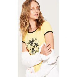 T-shirt z nadrukiem - Żółty. Żółte t-shirty damskie House, s, z nadrukiem, bez kołnierzyka. Za 39,99 zł.