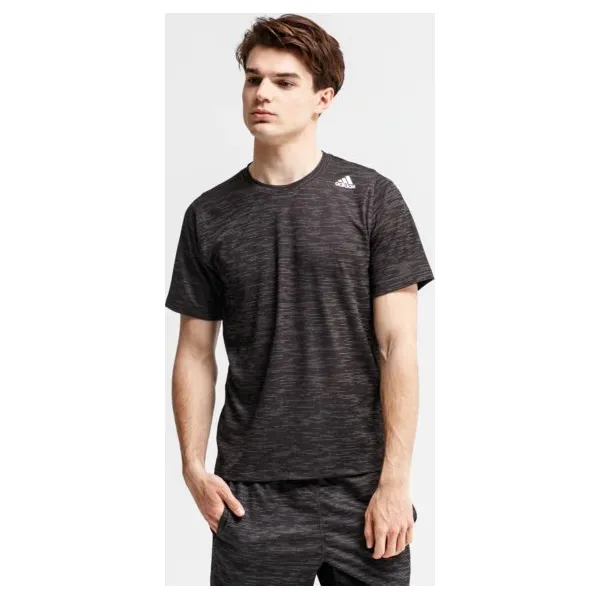 Adidas Koszulka Ss Fl Tec Z Ft Hea , szary, rozmiar M. Szare koszulki męskie Adidas, m, bez wzorów, ze skóry, sportowe, bez kołnierzyka, bez rękawów. W wyprzedaży za 99,99 zł.