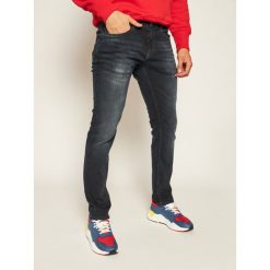 Jeansy Slim Fit Tommy Jeans Scanton DM0DM08271. Niebieskie jeansy męskie Tommy Jeans, m, bez wzorów. Za 449,00 zł.