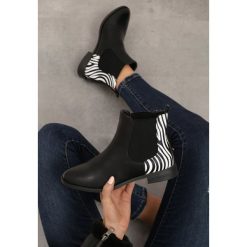 Czarne Botki Sameera. Czarne botki damskie Born2be, ze skóry, za kostkę, bez obcasa, na płaskiej podeszwie, bez zapięcia. Za 129,99 zł.