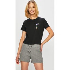 Puma - Top x Sue Tsai. Czarne bluzki damskie Puma, s, z nadrukiem, z elastanu, casualowe, z okrągłym kołnierzem. W wyprzedaży za 119,90 zł.
