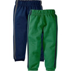 Spodnie dresowe (2 pary) bonprix ciemnoniebieski + zielony. Niebieskie dresy chłopięce marki bonprix, w paski, z dresówki. Za 24,99 zł.
