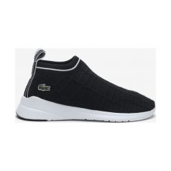 Lacoste Tenisówki Czarny. Czarne trampki i tenisówki damskie Lacoste, bez wzorów, z materiału, bez zapięcia. Za 550,95 zł.