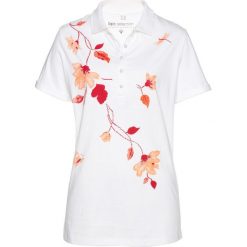 Shirt polo bonprix biało-czerwony z nadrukiem. Czerwone koszulki damskie marki bonprix, z nadrukiem, klasyczne, polo, bez rękawów. Za 54,99 zł.