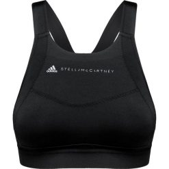 Top ADIDAS BY STELLA McCARTNEY. Czarne topy sportowe damskie adidas by Stella McCartney, bez wzorów, ze skóry, bez kołnierzyka. W wyprzedaży za 189,00 zł.