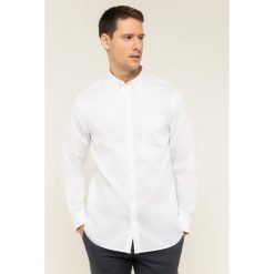 Koszula Guess M01H21 WCJR0. Niebieskie koszule męskie Guess, s, z aplikacjami, z elastanu, casualowe, bez kołnierzyka, bez rękawów. W wyprzedaży za 199,00 zł.