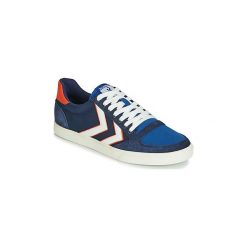 Buty Hummel SLIMMER STADIL LOW. Niebieskie trampki i tenisówki damskie Hummel, bez wzorów, bez zapięcia. Za 247,20 zł.