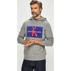 Calvin Klein Jeans - Bluza. Czarne bluzy męskie marki Calvin Klein Jeans, xl, z nadrukiem, z bawełny, z kapturem. Za 499,90 zł.