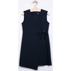 Sly - Sukienka dziecięca 134-164 cm. Niebieskie sukienki dziewczęce SLY, bez wzorów, z elastanu, eleganckie, bez rękawów, mini, asymetryczne. W wyprzedaży za 139,90 zł.