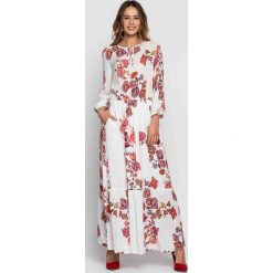 Sukienka maxi w kwiaty z długim rękawem i wiązaniem na dekolcie RABARBAR. Sukienki damskie RABARBAR, na imprezę, na lato, w kwiaty, z wiskozy, bez kołnierzyka, z długim rękawem, długie, maxi. Za 435,00 zł.