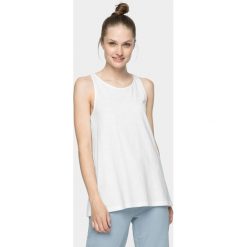 Top damski. Topy damskie l, bez wzorów, z bawełny, bez kołnierzyka. W wyprzedaży za 29,99 zł.