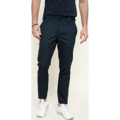 Dickies - Spodnie. Niebieskie spodnie męskie Dickies, na co dzień, z haftami, z bawełny. W wyprzedaży za 139,90 zł.
