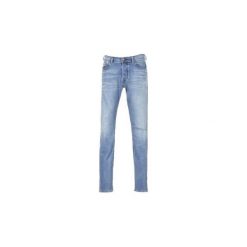 Jeansy slim fit Diesel TEPPHAR. Niebieskie jeansy męskie relaxed fit Diesel. Za 789,00 zł.