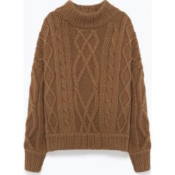 Sweter "Bobinette" w kolorze karmelowym. Pomarańczowe swetry damskie American Vintage, s, bez wzorów, z wełny, bez rękawów, bez kaptura. W wyprzedaży za 285,95 zł.