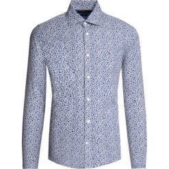 Koszula TOMMY HILFIGER MW0MW11529. Niebieskie koszule męskie TOMMY HILFIGER, m, bez wzorów, z bawełny, casualowe, bez kołnierzyka, bez rękawów. W wyprzedaży za 279,00 zł.