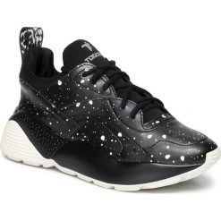 Sneakersy TOGOSHI - TG-16-03-000136 601. Czarne półbuty damskie Togoshi, na co dzień, bez wzorów, ze skóry ekologicznej, bez obcasa, na płaskiej podeszwie, bez zapięcia. W wyprzedaży za 279,00 zł.