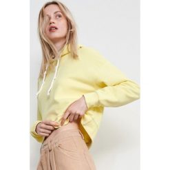 Bluza z bawełny organicznej - Żółty. Żółte bluzy damskie Reserved, s, bez wzorów, z bawełny, bez rękawów, bez kaptura. W wyprzedaży za 39,99 zł.