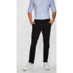 Calvin Klein - Spodnie. Szare bez kategorii marki Calvin Klein, z elastanu. Za 399,90 zł.
