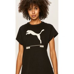 Puma - T-shirt. Białe bluzki damskie Puma, s, z aplikacjami, z elastanu, z okrągłym kołnierzem. Za 99,90 zł.