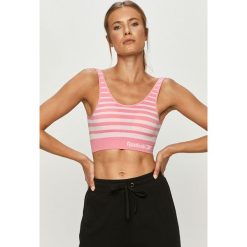 Reebok - Biustonosz sportowy. Różowe biustonosze sportowe damskie Reebok, s, bez wzorów, z elastanu. Za 69,90 zł.