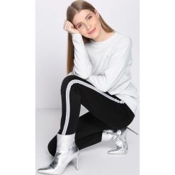 Czarno-Białe Spodnie Dresowe Patience. Czarne spodnie dresowe damskie Born2be, xl, z dresówki. Za 29,99 zł.