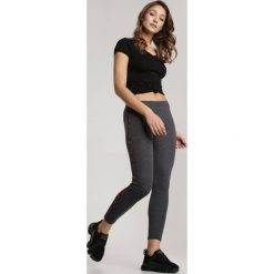 Ciemnoszare Legginsy Evidorise. Szare legginsy damskie Renee, s, bez wzorów, klasyczne. Za 39,99 zł.