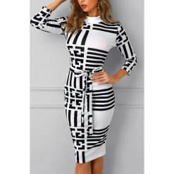 Sukienka NERRY. Czarne sukienki damskie Sukienka NERRY, s, bez wzorów, eleganckie, bez kołnierzyka, z długim rękawem, długie. W wyprzedaży za 99,00 zł.