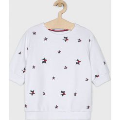 Tommy Hilfiger - Bluza dziecięca 128-176 cm. Białe bluzy dziewczęce TOMMY HILFIGER, bez wzorów, z elastanu, bez rękawów, bez kaptura. W wyprzedaży za 199,90 zł.