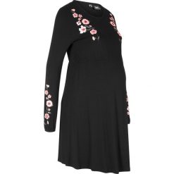 Sukienka ciążowa z dżerseju bonprix czarny w kwiaty. Czarne sukienki damskie bonprix, z aplikacjami, z dżerseju, bez kołnierzyka, moda ciążowa, bez rękawów. Za 109,99 zł.