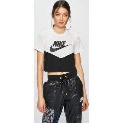 Nike Sportswear - Top. Czarne topy damskie marki Nike Sportswear, s, z nadrukiem, z bawełny, z okrągłym kołnierzem. Za 119,90 zł.