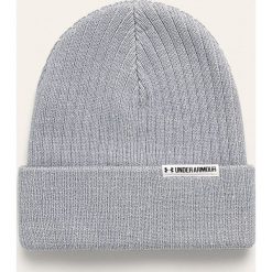 Under Armour - Czapka. Niebieskie czapki damskie Under Armour, bez wzorów, z dzianiny. W wyprzedaży za 69,90 zł.