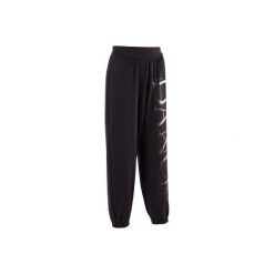 Spodnie do tańca damskie. Czarne spodnie sportowe damskie marki DOMYOS, xs, z elastanu, na fitness i siłownię. Za 79,99 zł.