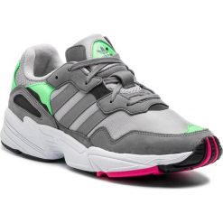 Buty adidas - Yung-96 F35020 Gretwo/Grethr/Shopnk. Szare buty sportowe męskie Adidas, ze skóry ekologicznej, bez zapięcia. W wyprzedaży za 269,00 zł.