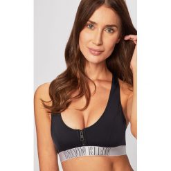 Calvin Klein Jeans - Biustonosz kąpielowy. Czarne stroje kąpielowe damskie Calvin Klein Jeans, xs, bez wzorów, z elastanu. W wyprzedaży za 179,90 zł.