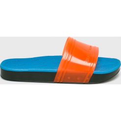 Melissa - Klapki Rider. Pomarańczowe klapki damskie Melissa, bez wzorów, z gumy, bez obcasa, na obcasie. W wyprzedaży za 219,90 zł.