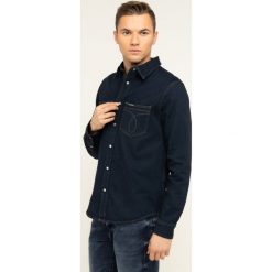Koszula Calvin Klein Jeans Iconic Deadwood J30J313654. Niebieskie koszule męskie Calvin Klein Jeans, xl, bez wzorów, z bawełny, casualowe, bez kołnierzyka, bez rękawów. W wyprzedaży za 169,00 zł.
