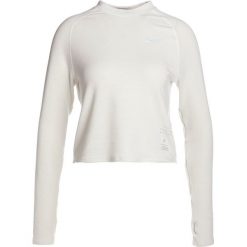 Nike Performance CREW MOCK RUN DIVISION Koszulka sportowa beige. Brązowe t-shirty damskie Nike Performance, l, z elastanu, z długim rękawem. W wyprzedaży za 129,50 zł.