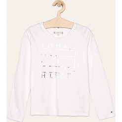 Tommy Hilfiger - Longsleeve dziecięcy 140-176 cm. Białe bluzki dziewczęce TOMMY HILFIGER, z nadrukiem, z bawełny, z okrągłym kołnierzem, z długim rękawem, długie, bez kaptura. Za 139,90 zł.