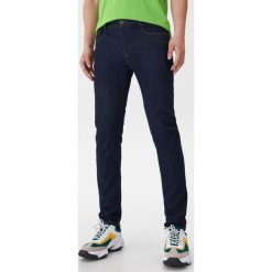 Jeansy slim fit - Niebieski. Niebieskie jeansy męskie House, m, bez wzorów. Za 129,99 zł.