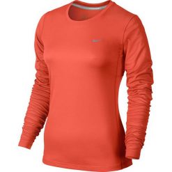 Nike Koszulka damska Miler Long Sleeve pomarańczowa r. XS (686904 842). Brązowe topy sportowe damskie marki Nike, xs. Za 100,00 zł.