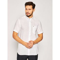 Koszula TOMMY HILFIGER MW0MW12786. Niebieskie koszule męskie TOMMY HILFIGER, s, bez wzorów, ze lnu, casualowe, bez kołnierzyka, bez rękawów. W wyprzedaży za 269,00 zł.