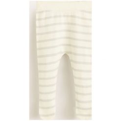 Mango Kids - Legginsy dziecięce 62-74 cm. Szare spodnie dziewczęce marki Mango Kids, bez wzorów, z bawełny. Za 49,90 zł.